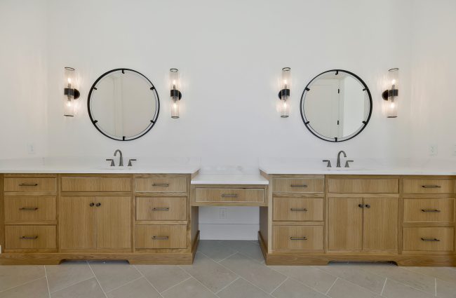 Primary Bathroom with Stained Cabinets by Christina Morris Design Primary Bathroom with Stained Cabinets