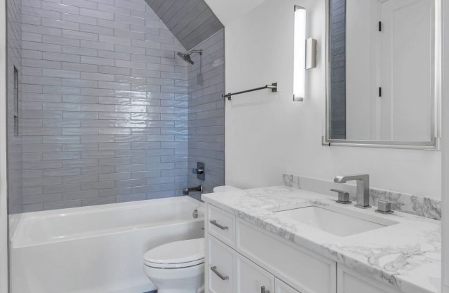 951 Evans Road Nashville, TN Secondary Bath | Interiors by Christina Morris Design, Home Built by McKenzie Construction, Plumbing and Lighting from Ferguson Home, Tile from GIO Tile Distributors, Countertops from MC Granite, Cabinets by Thomas Lain Cabinetry 951 Evans Road Secondary Bath by Christina Morris Design