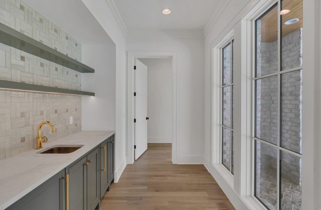 4108 Outer Drive Nashville, TN Wet Bar | Interiors by Christina Morris Design, Home Built by McKenzie Construction, Plumbing from Ferguson Home, Tile from GIO Tile Distributors, Countertops from MC Granite Nashville, Cabinets by Thomas Lain Cabinetry 4108 Outer Drive by Christina Morris Design