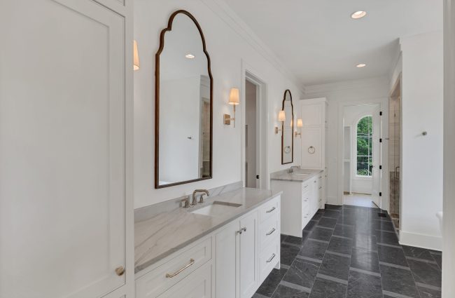 4108 Outer Drive Nashville, TN | Interiors by Christina Morris Design, Home Built by McKenzie Construction, Plumbing and Lighting from Ferguson Home, Mirrors from Uttermost, Tile from GIO Tile Distributors, Countertops from MC Granite Nashville, Cabinets by Thomas Lain Cabinetry 4108 Outer Drive Nashville, TN Primary Bath by Christina Morris Design